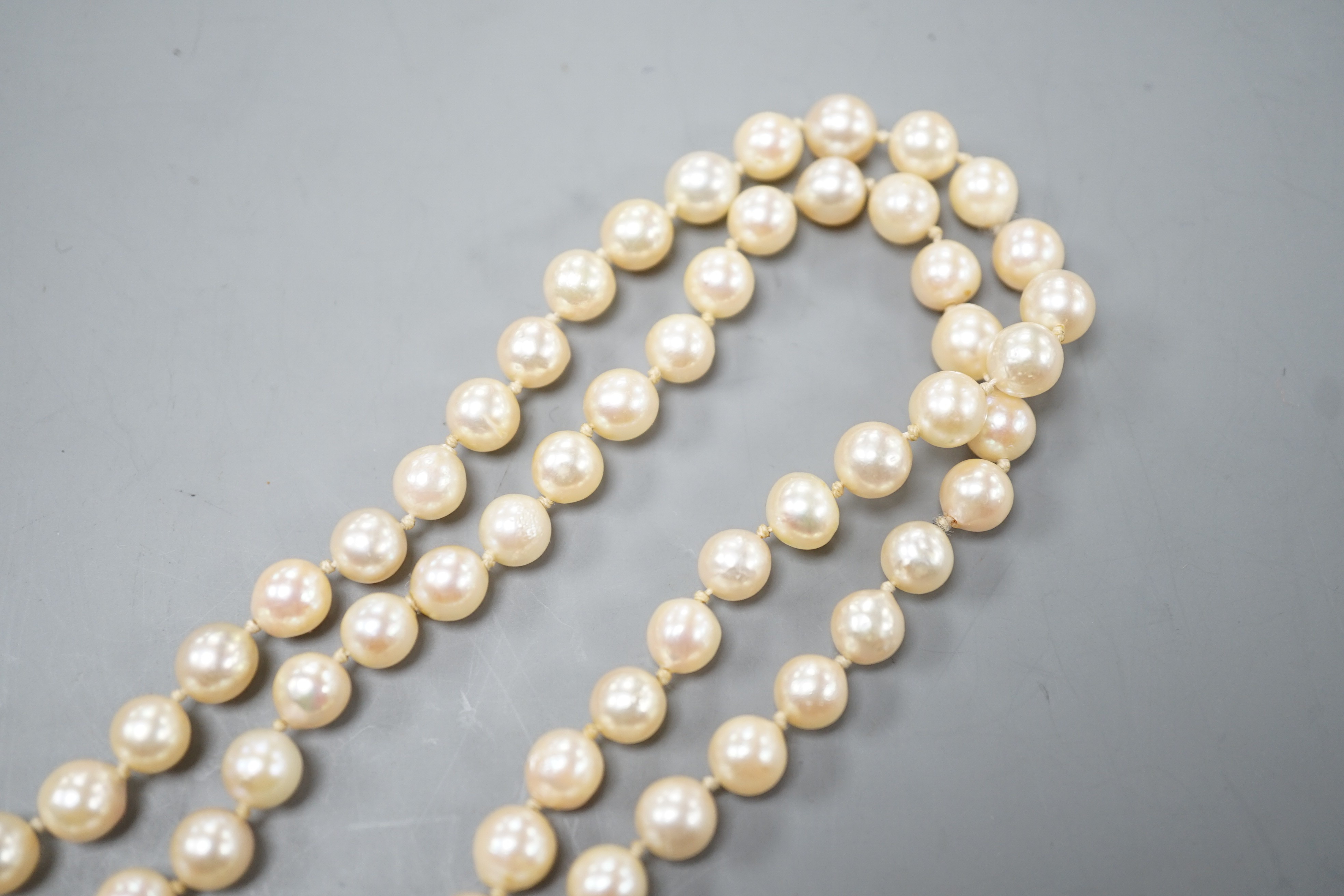 A single strand culture pearl necklace with cultured pearl set sterling clasp, 74cm.